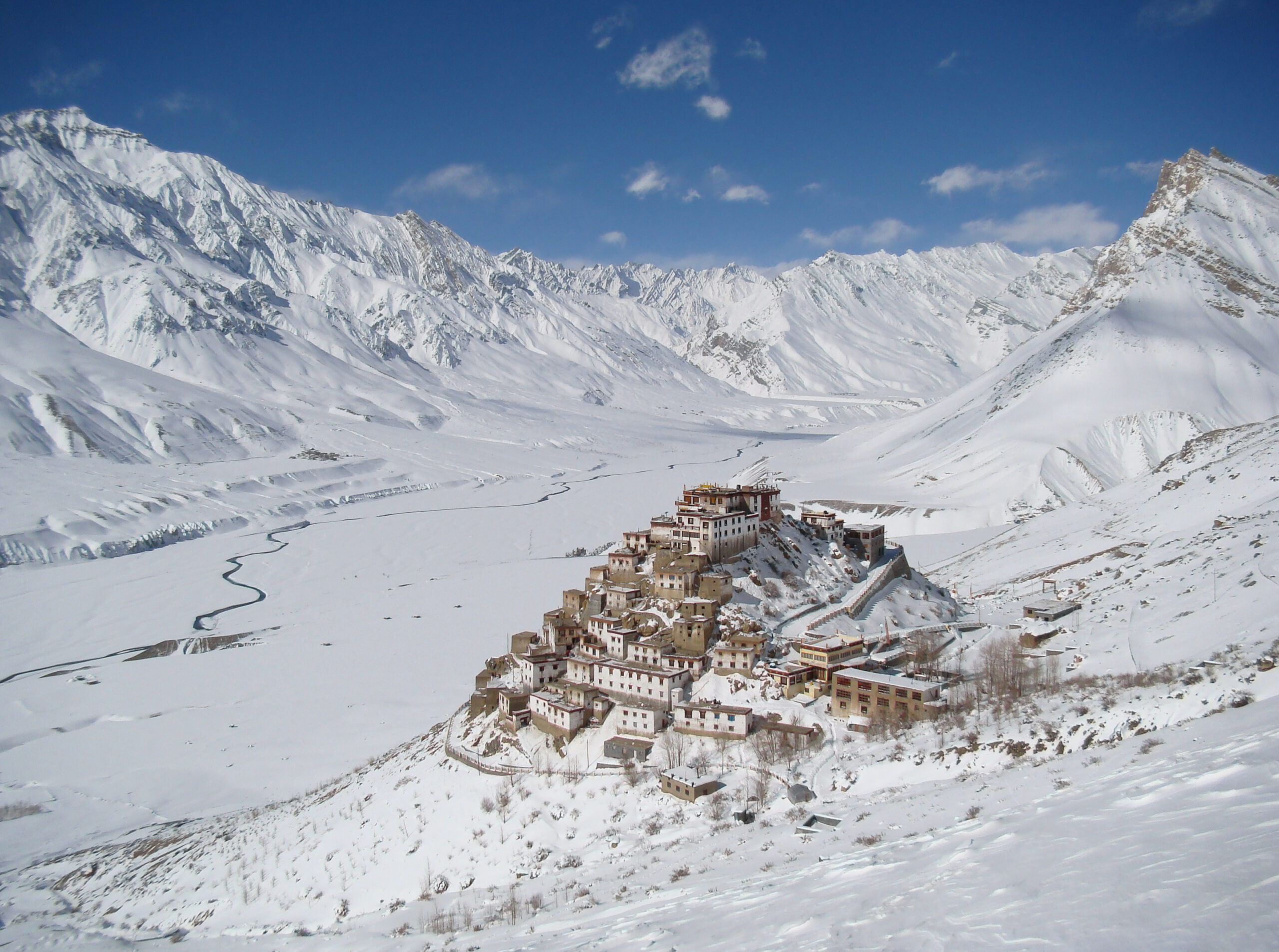 Snow-covered Key Monastery amidst Himalayan peaks